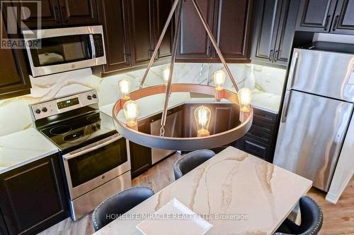 602 - 560 North Service Road, Grimsby, ON - Indoor Photo Showing Kitchen With Stainless Steel Kitchen