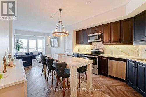 602 - 560 North Service Road, Grimsby, ON - Indoor Photo Showing Kitchen With Stainless Steel Kitchen