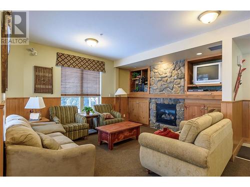 9812 Silver Star Road Unit# 312, Vernon, BC - Indoor Photo Showing Living Room With Fireplace