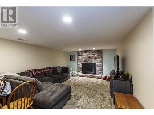 3908 15 Street, Vernon, BC - Indoor Photo Showing Living Room With Fireplace