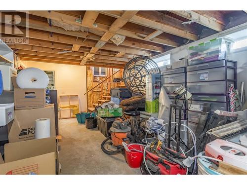 Lots of storage - 235 Gibbs Road W, Kelowna, BC - Indoor Photo Showing Basement