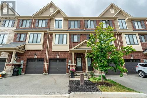 149 - 1890 Rymal Road E, Hamilton, ON - Outdoor With Facade