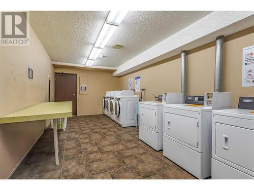 Coin Laundry-fast and efficient - 435 Franklyn Road Unit# 114, Kelowna, BC - Indoor Photo Showing Laundry Room