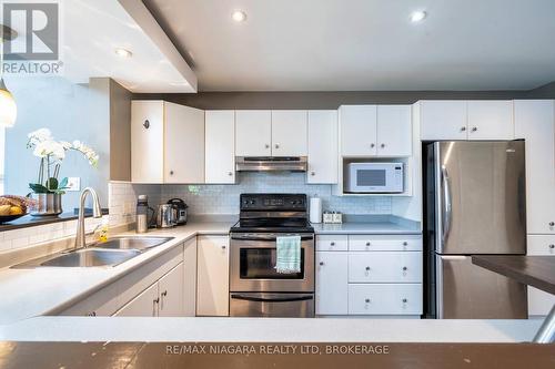 3829 Northwood Drive, Niagara Falls (208 - Mt. Carmel), ON - Indoor Photo Showing Kitchen With Stainless Steel Kitchen With Double Sink