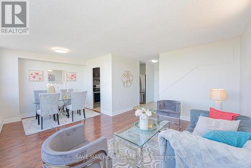 322 - 1050 Stainton Drive, Mississauga, ON - Indoor Photo Showing Living Room