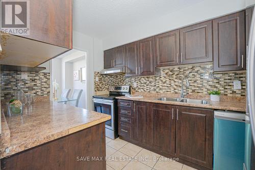 322 - 1050 Stainton Drive, Mississauga, ON - Indoor Photo Showing Kitchen With Double Sink