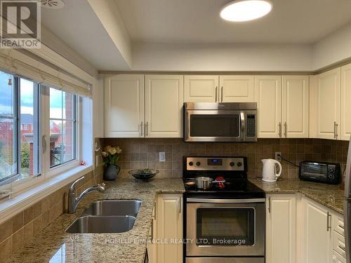 28 - 2508 Post Road, Oakville, ON - Indoor Photo Showing Kitchen With Double Sink