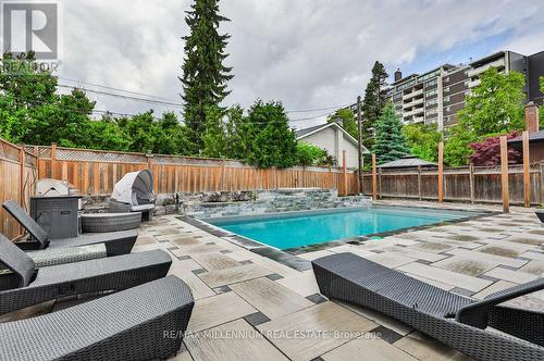 246 Edenbridge Drive, Toronto, ON - Outdoor With In Ground Pool