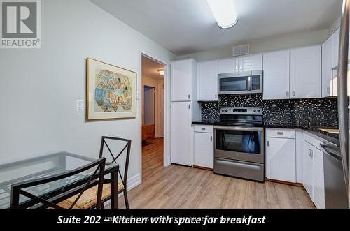 202 - 1400 Dixie Road, Mississauga, ON - Indoor Photo Showing Kitchen