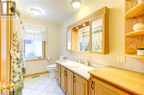 Bathroom featuring tile patterned floors, vanity, and toilet - 3 Maitland Street, Blandford, ON - Indoor Photo Showing Bathroom