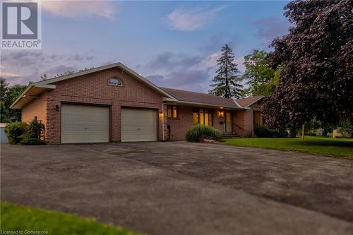 Single story home with a garage and a lawn - 3 Maitland Street, Blandford, ON - Outdoor With Facade