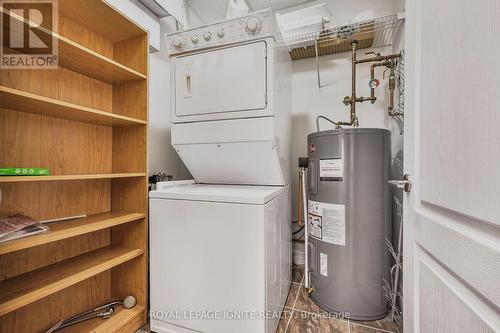 801 - 44 Bond Street W, Oshawa, ON - Indoor Photo Showing Laundry Room