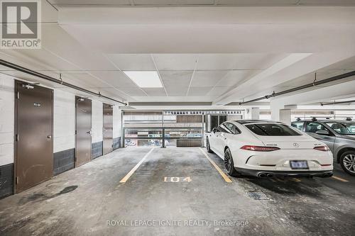 801 - 44 Bond Street W, Oshawa, ON - Indoor Photo Showing Garage