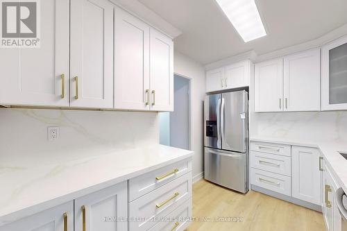 610 - 120 Dundalk Drive, Toronto, ON - Indoor Photo Showing Kitchen