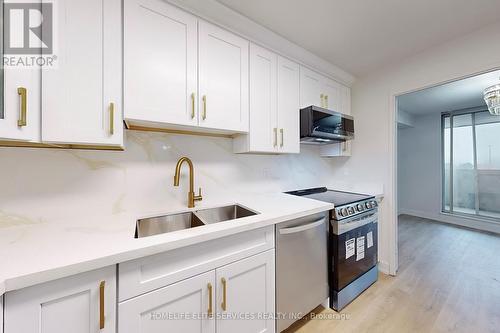 610 - 120 Dundalk Drive, Toronto, ON - Indoor Photo Showing Kitchen With Double Sink