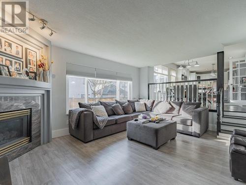 630 Nicola Avenue, Coquitlam, BC - Indoor Photo Showing Living Room With Fireplace