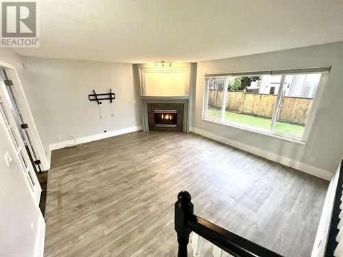 630 Nicola Avenue, Coquitlam, BC - Indoor Photo Showing Living Room With Fireplace