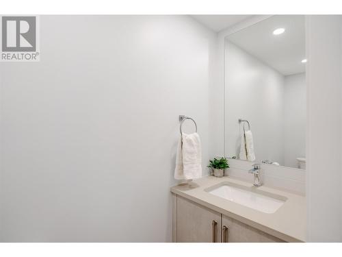 Guest bathroom on the main - 3960 June Springs Road, Kelowna, BC - Indoor Photo Showing Bathroom