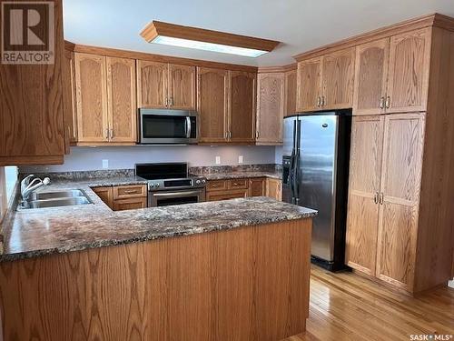 201 Milburn Street, Melfort, SK - Indoor Photo Showing Kitchen With Double Sink