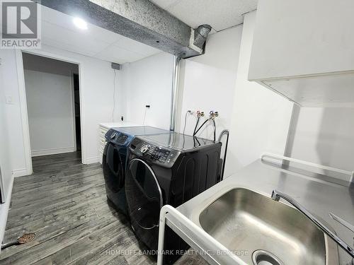 Bsmt - 62 Rainier Square, Toronto, ON - Indoor Photo Showing Laundry Room