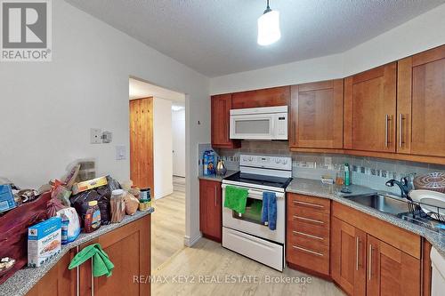 312 - 61 Markbrook Lane, Toronto, ON - Indoor Photo Showing Kitchen