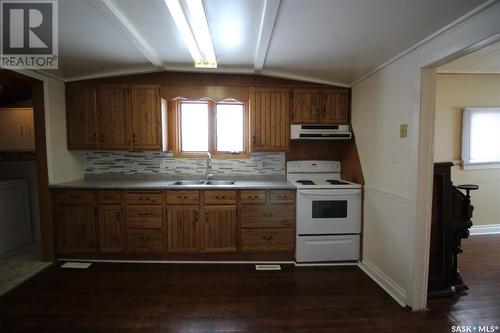 225 1St Avenue W, Frontier, SK - Indoor Photo Showing Kitchen With Double Sink