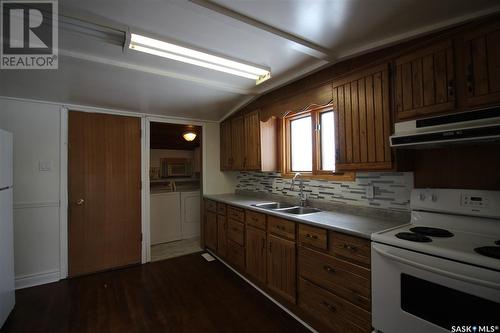 225 1St Avenue W, Frontier, SK - Indoor Photo Showing Kitchen With Double Sink