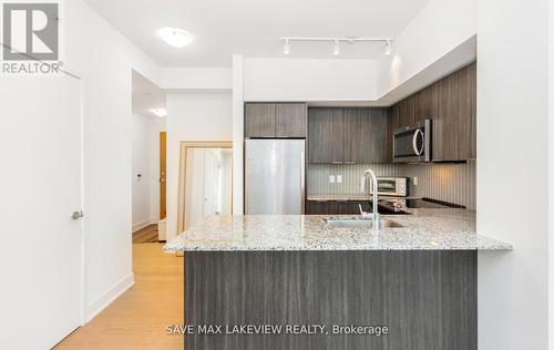 1616 - 30 Shore Breeze Drive S, Toronto, ON - Indoor Photo Showing Kitchen With Stainless Steel Kitchen