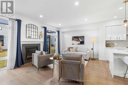 920 Brian Good Avenue, Ottawa, ON - Indoor Photo Showing Living Room With Fireplace