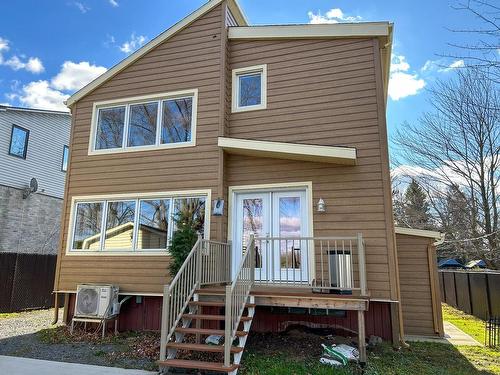 Back facade - 75 Rue De L'Arpenteur, Drummondville, QC - Outdoor With Deck Patio Veranda