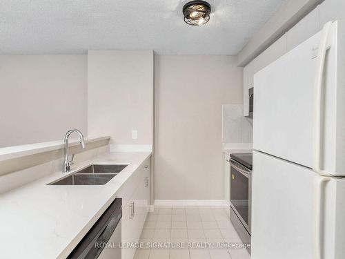 1504-10 Yonge St, Toronto, ON - Indoor Photo Showing Kitchen With Double Sink