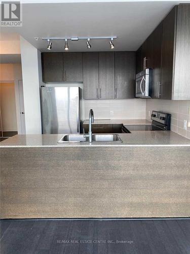 1705 - 3985 Grand Park Drive, Mississauga, ON - Indoor Photo Showing Kitchen With Double Sink