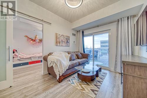 205 - 2150 Lawrence Avenue E, Toronto, ON - Indoor Photo Showing Living Room