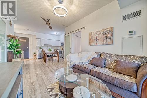 205 - 2150 Lawrence Avenue E, Toronto, ON - Indoor Photo Showing Living Room