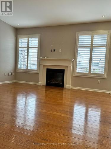 24 Dulverton Drive, Brampton, ON - Indoor Photo Showing Living Room With Fireplace