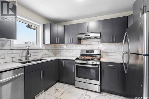 305075 Mierau Road, Corman Park Rm No. 344, SK - Indoor Photo Showing Kitchen With Double Sink With Upgraded Kitchen