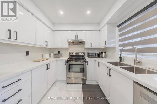 59 Prince Charles Way, Markham, ON - Indoor Photo Showing Kitchen With Double Sink