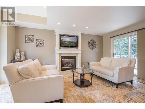 9094 North Nechako Road, Prince George, BC - Indoor Photo Showing Living Room With Fireplace