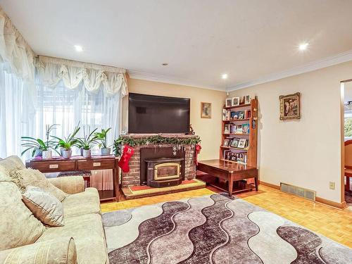 Family room - 2066 Rue Laniel, Montréal (L'Île-Bizard/Sainte-Geneviève), QC - Indoor Photo Showing Living Room With Fireplace