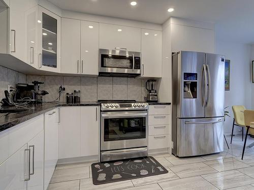 Cuisine - 323 Rue Des Vosges, Laval (Vimont), QC - Indoor Photo Showing Kitchen With Upgraded Kitchen