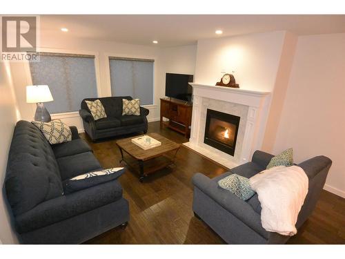 3237 Third Avenue, Smithers, BC - Indoor Photo Showing Living Room With Fireplace