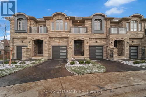 2 - 675 Victoria Road N, Guelph, ON - Outdoor With Balcony With Facade