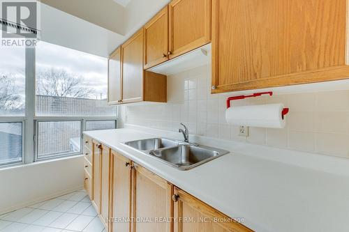 201 - 897 Sheppard Avenue W, Toronto, ON - Indoor Photo Showing Kitchen With Double Sink