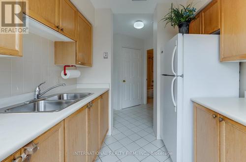 201 - 897 Sheppard Avenue W, Toronto, ON - Indoor Photo Showing Kitchen With Double Sink