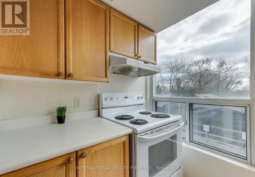 201 - 897 Sheppard Avenue W, Toronto, ON - Indoor Photo Showing Kitchen With Double Sink