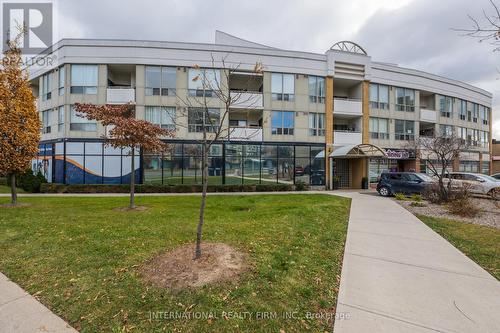 201 - 897 Sheppard Avenue W, Toronto, ON - Outdoor With Balcony With Facade