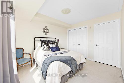 310 - 50 Bryan Court, Kitchener, ON - Indoor Photo Showing Bedroom