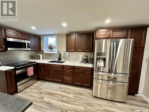 2450 Edgar Street, Regina, SK - Indoor Photo Showing Kitchen With Double Sink