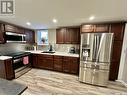 2450 Edgar Street, Regina, SK  - Indoor Photo Showing Kitchen With Double Sink 