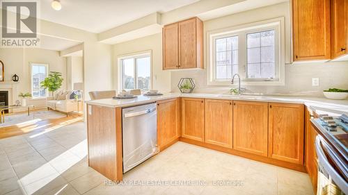 1184 Drinkle Crescent, Oshawa, ON - Indoor Photo Showing Kitchen With Fireplace